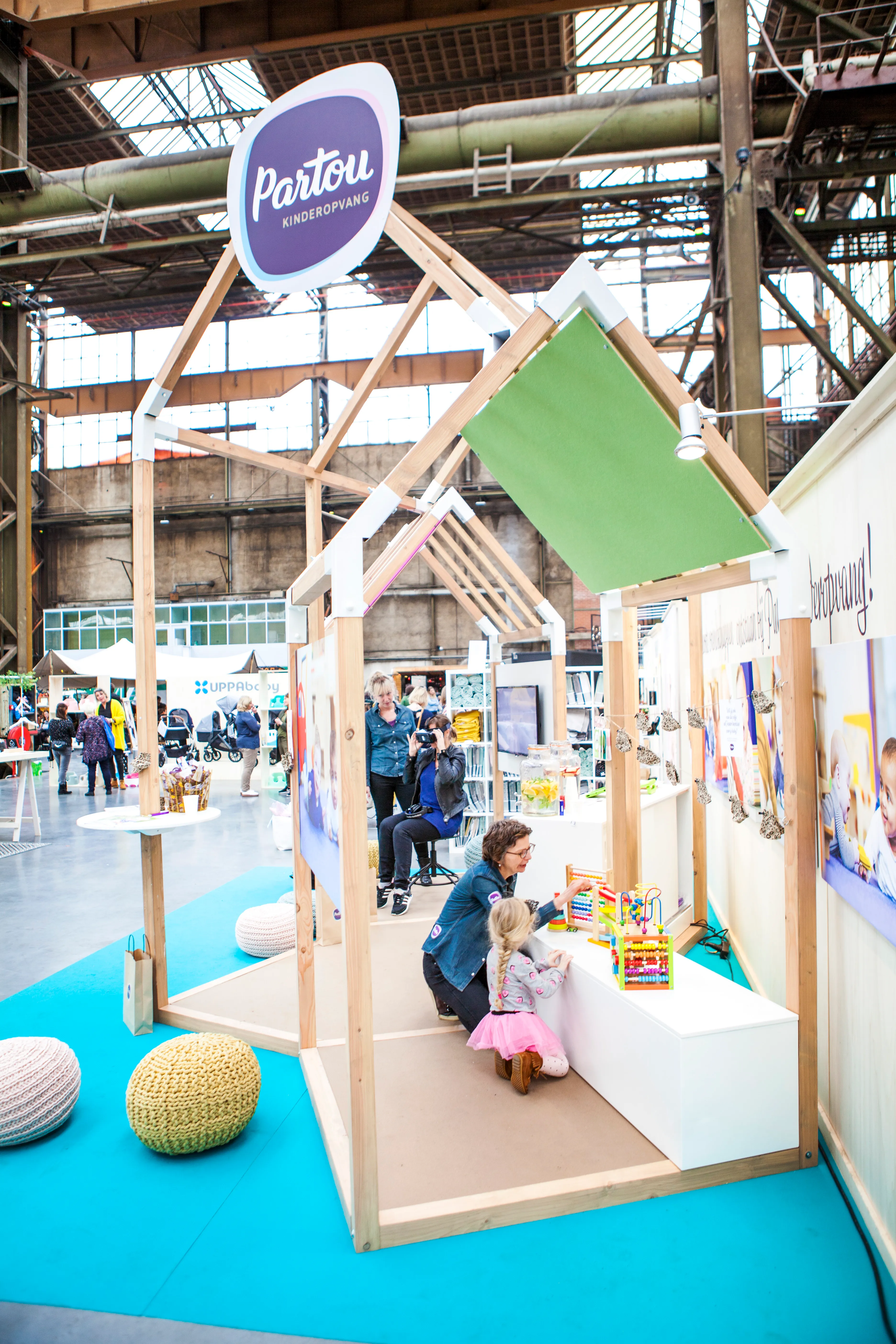 Open and inviting stand for Partou at 'We Are Pregnant'